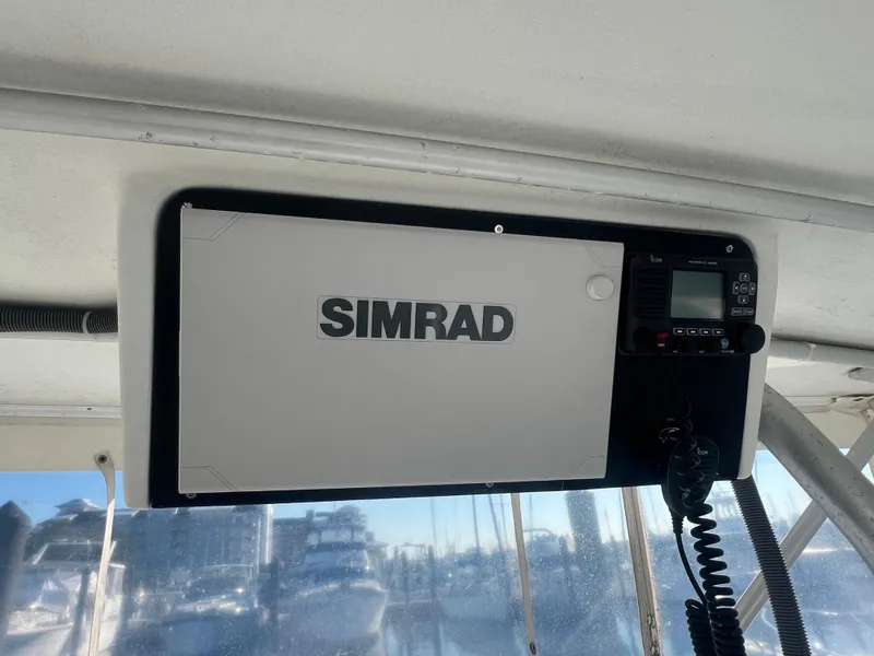 Slide: The Image of Simrad navigation system on a 1995 Luhrs Tournament 290 Open boat. - 7