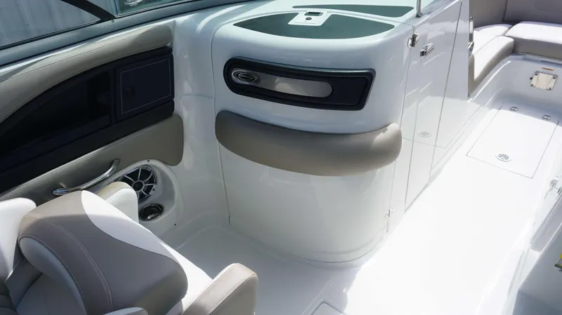 Slide: The Image of Interior of 2024 Crownline 240 DC boat, featuring sleek seating and modern design. - 18