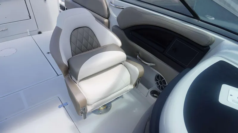 Slide: The Image of 2024 Crownline 240 DC boat interior with luxurious seating and modern design. - 8