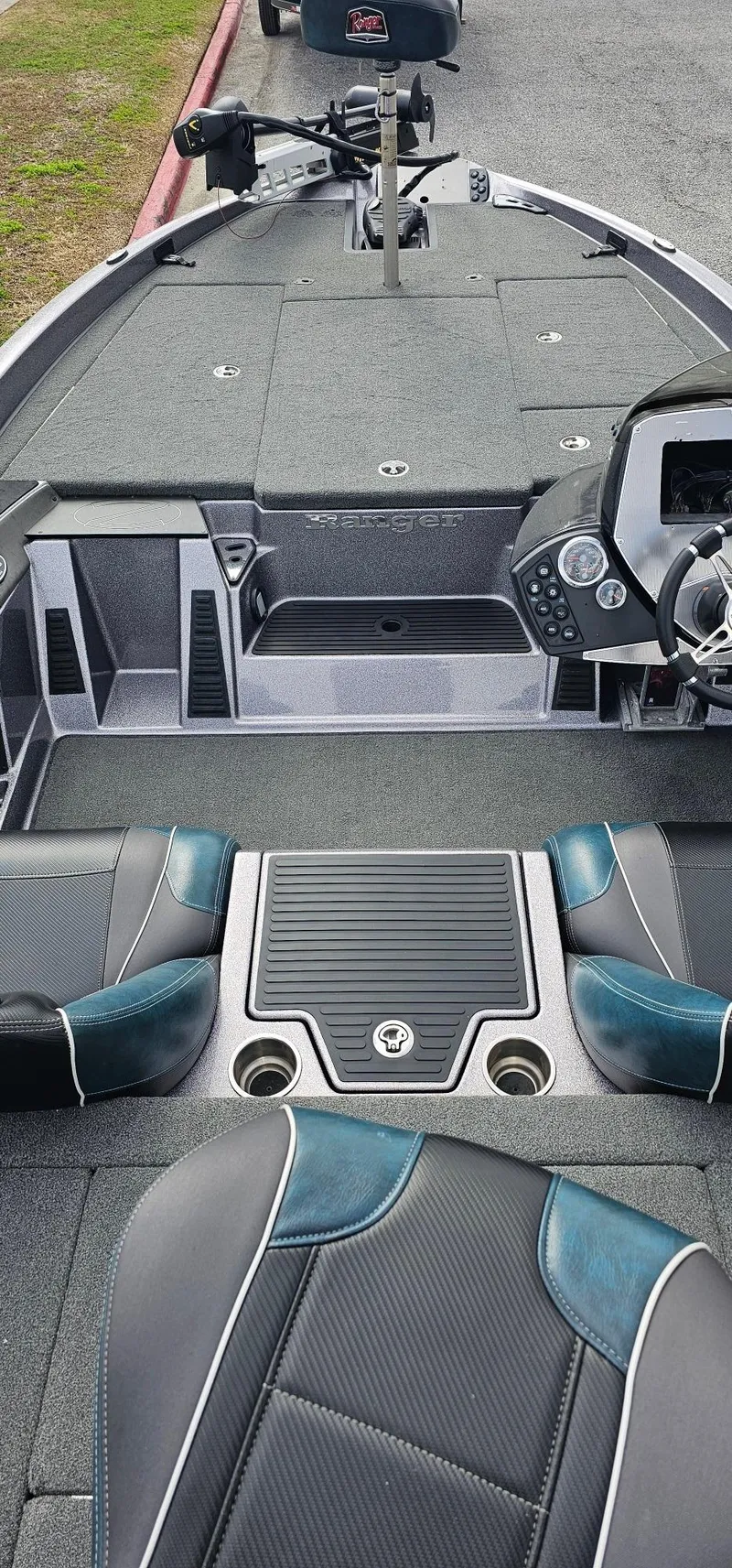 Slide: The Image of 2017 Ranger 518 boat interior with modern dashboard and seating. - 3