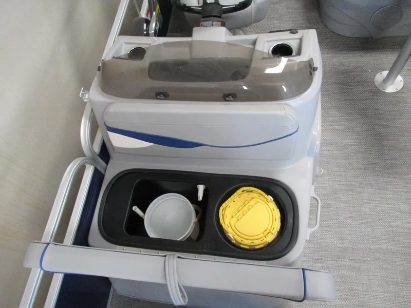 Slide: The Image of 2024 Bennington 20 SVF boat console with storage compartment and accessories. - 3
