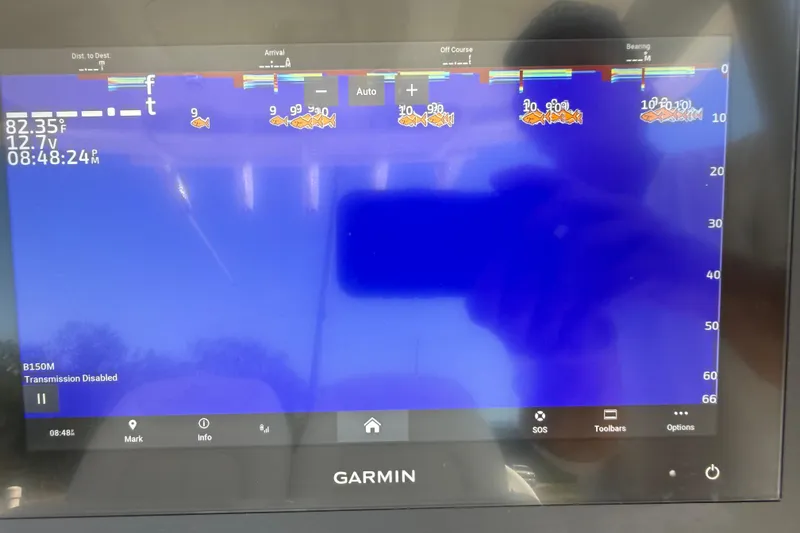Slide: The Image of Garmin marine display showing sonar data on a 2023 Regulator 26XO boat. - 17