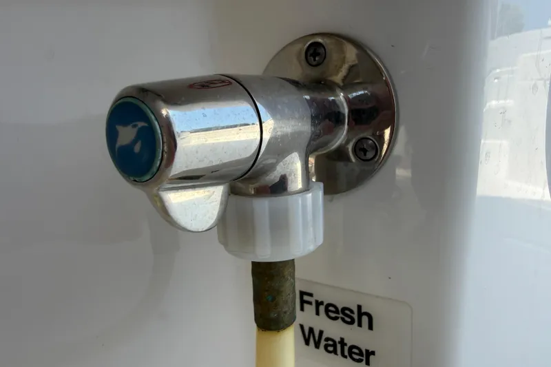 Slide: The Image of Fresh water faucet on 2023 Regulator 26XO boat. - 47