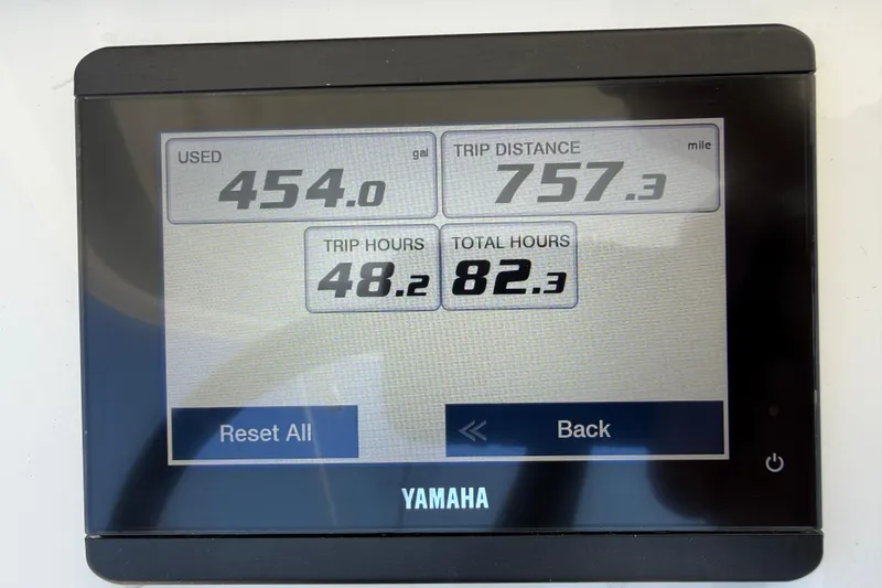 Slide: The Image of Yamaha display showing fuel usage, trip distance, and hours for 2023 Regulator 26XO boat. - 18