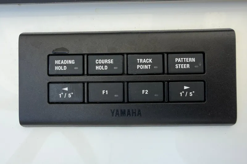 Slide: The Image of Yamaha control panel with navigation buttons on a 2023 Regulator 26XO boat. - 20