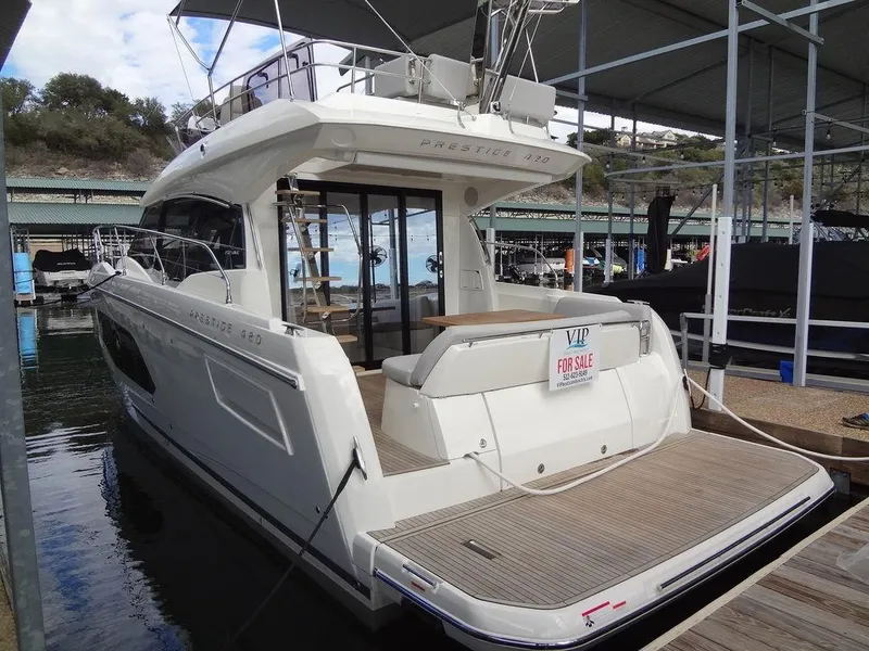 Slide: The Image of 2024 Prestige 420F yacht for sale, docked at marina. - 18