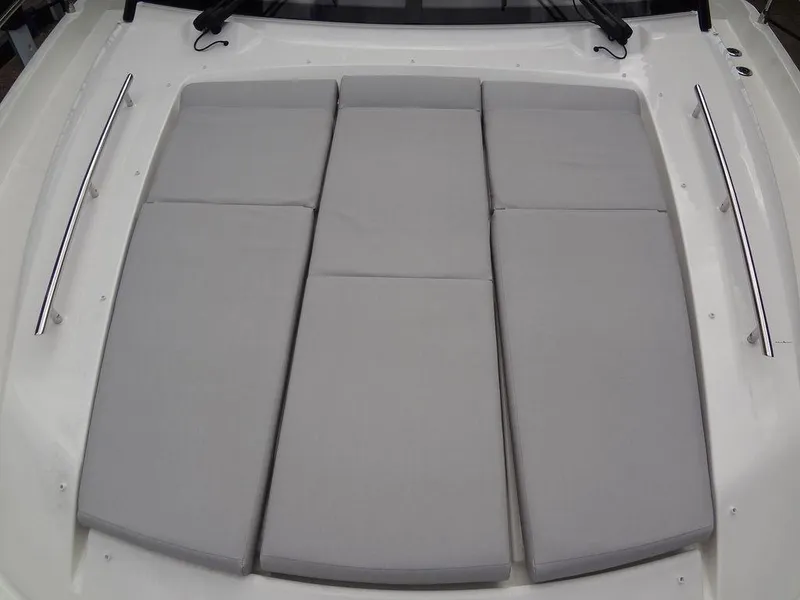 Slide: The Image of 2024 Prestige 420F boat with cushioned sunbathing area. - 24