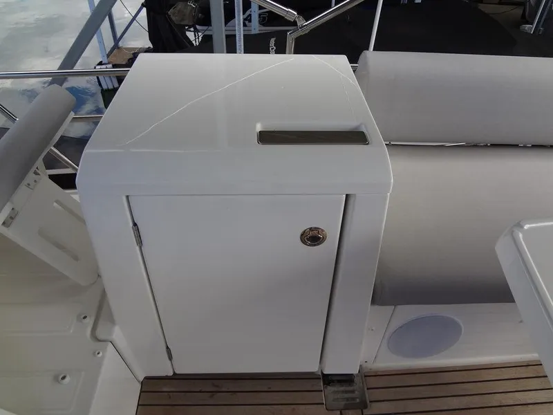 Slide: The Image of Prestige 420F 2024 yacht interior with white cabinet and cushioned seating. - 36