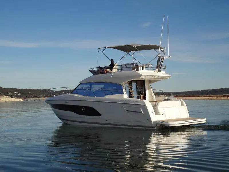 Slide: The Image of 2024 Prestige 420F yacht cruising on calm waters. - 4