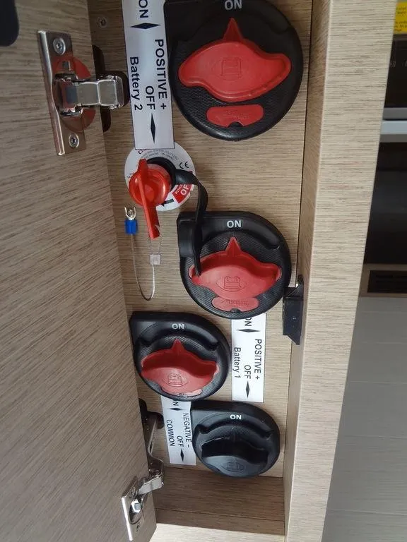 Slide: The Image of Battery switches and controls inside a 2024 Prestige 420F yacht. - 44