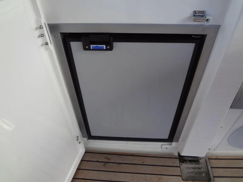 Slide: The Image of Prestige 420F 2024 model refrigerator door on wooden deck. - 46