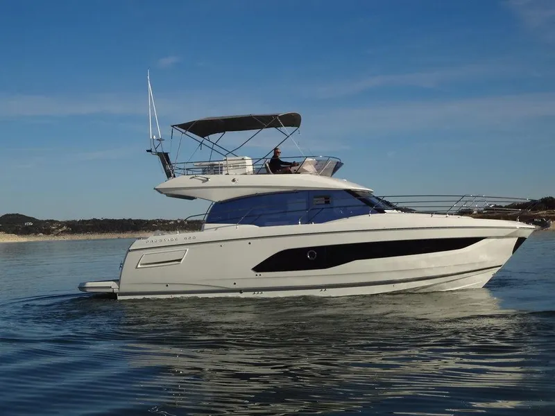 Slide: The Image of 2024 Prestige 420F yacht cruising on calm waters. - 6