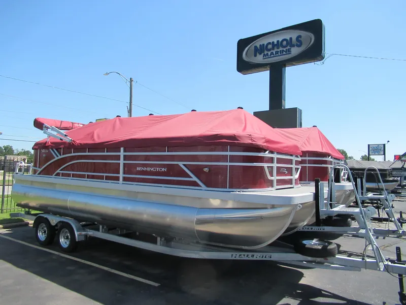Slide: The Image of 2024 Bennington 22 SVSR pontoon boat with red cover at Nichols Marine. - 0
