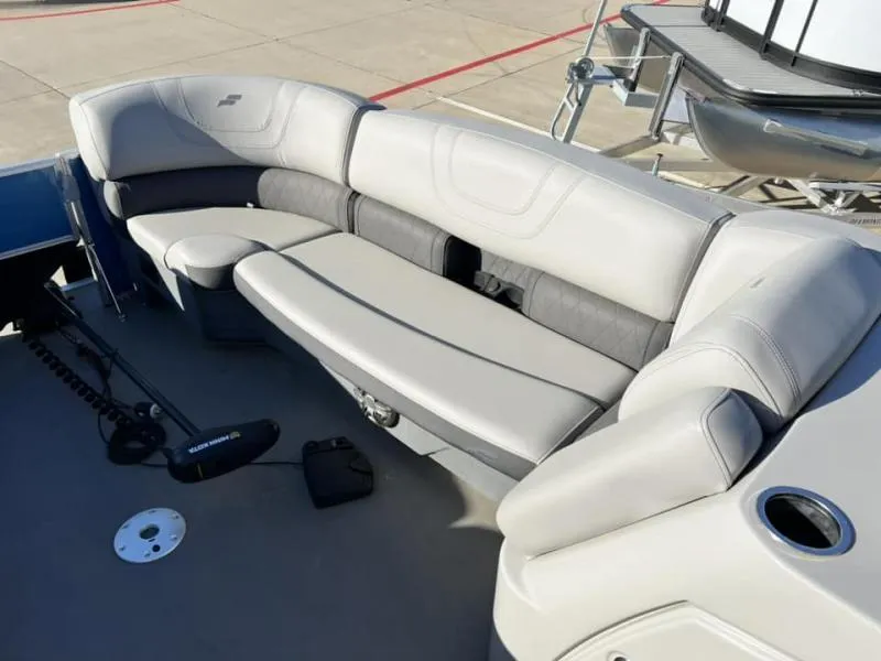 Slide: The Image of 2023 Starcraft CX 23 FD boat with spacious seating area. - 16