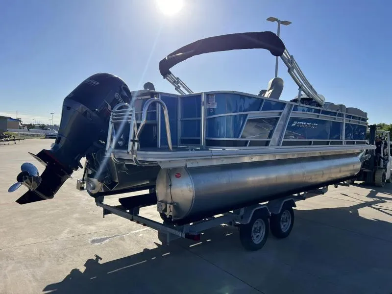Slide: The Image of 2023 Starcraft CX 23 FD pontoon boat on trailer with outboard motor. - 3