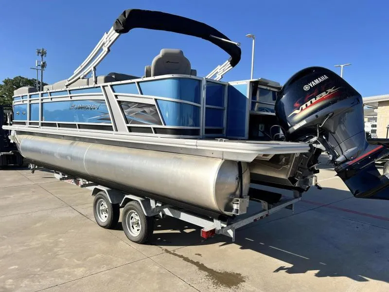 Slide: The Image of 2023 Starcraft CX 23 FD pontoon boat with Yamaha outboard motor on trailer. - 4