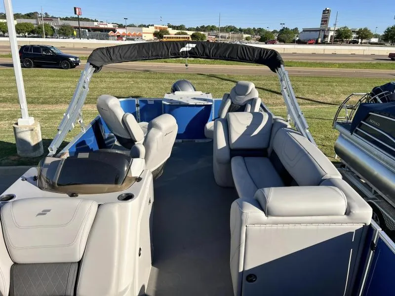 Slide: The Image of 2023 Starcraft CX 23 FD pontoon boat with spacious seating and canopy. - 7