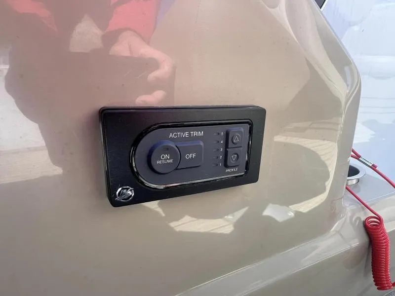 Slide: The Image of Active trim control panel on 2023 Starcraft CX 25 DL BAR boat. - 17
