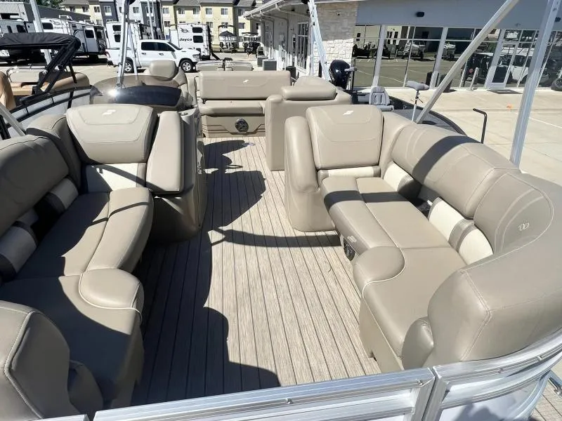 Slide: The Image of 2023 Starcraft CX 25 DL BAR pontoon boat with spacious seating and modern design. - 7