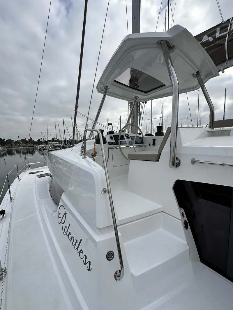 Slide: The Image of 2024 Bali 4.4 yacht with sleek design and modern helm station. - 17