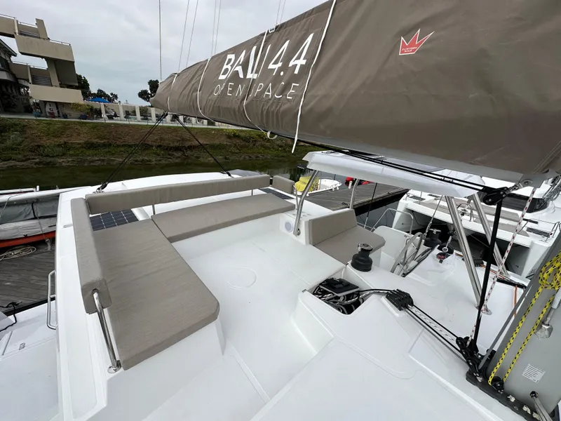 Slide: The Image of 2024 Bali 4.4 sailboat with spacious deck and comfortable seating. - 21
