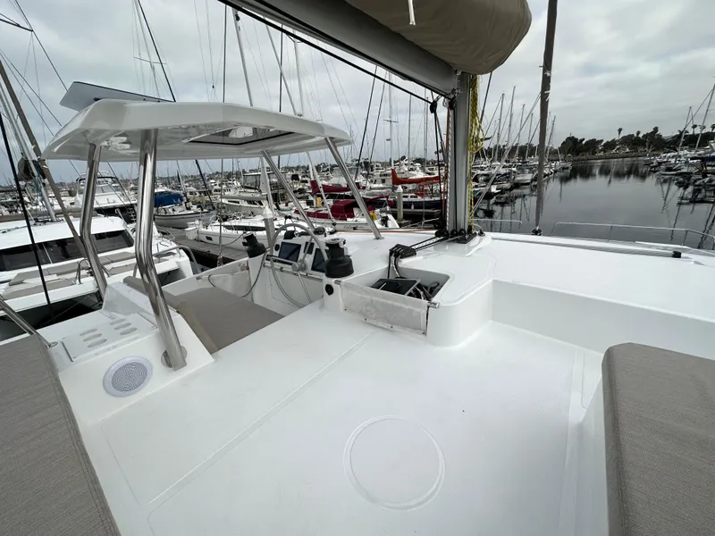 Slide: The Image of 2024 Bali 4.4 yacht deck with marina view. - 23