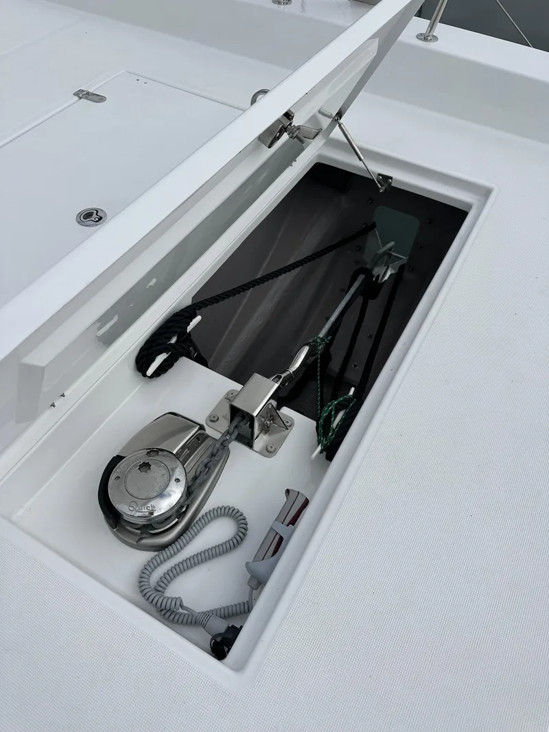 Slide: The Image of 2024 Bali 4.4 yacht anchor locker with winch and rope storage. - 32