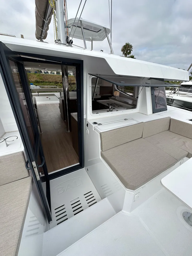 Slide: The Image of 2024 Bali 4.4 yacht with open deck and interior view. - 35