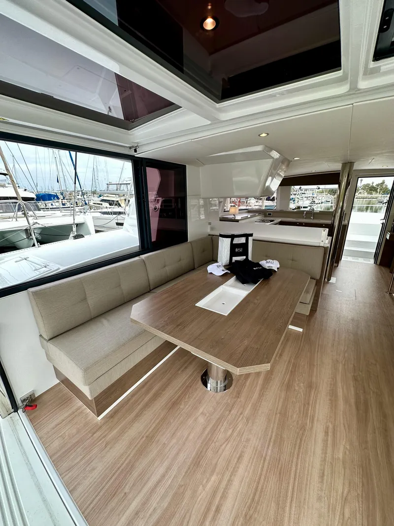Slide: The Image of Modern interior of 2024 Bali 4.4 yacht with spacious dining area and large windows. - 39
