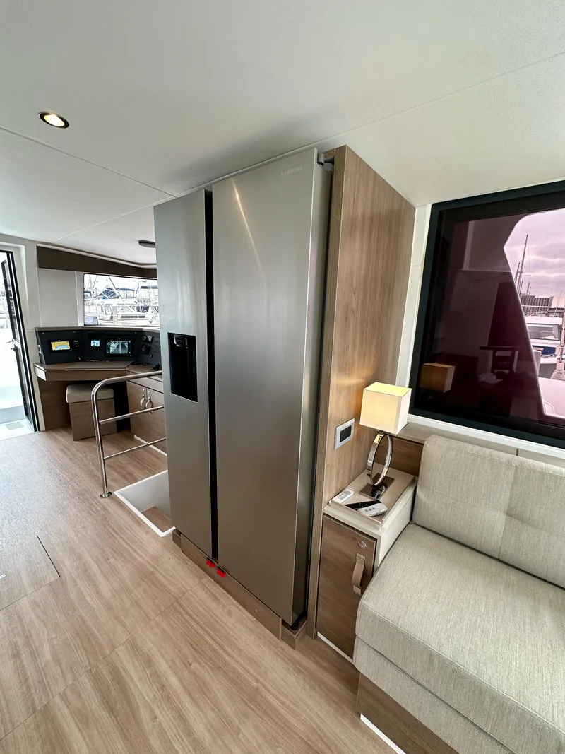 Slide: The Image of Modern interior of 2024 Bali 4.4 yacht with sleek kitchen and cozy seating area. - 41