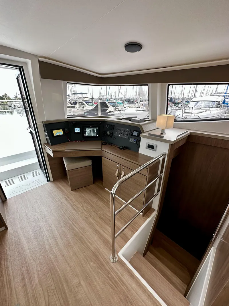 Slide: The Image of Interior helm station of 2024 Bali 4.4 catamaran with modern navigation equipment. - 43