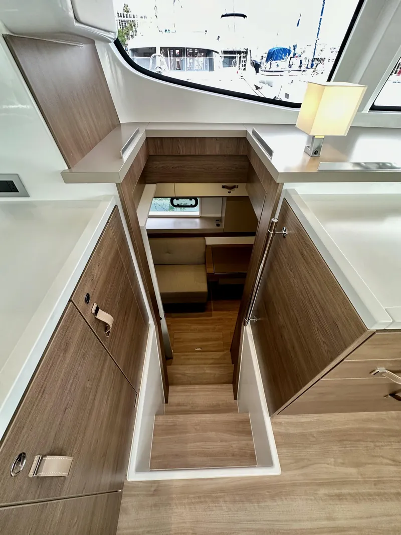 Slide: The Image of Modern interior of 2024 Bali 4.4 yacht with wooden stairs and cabinets. - 47