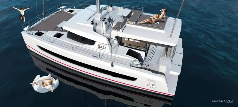Slide: The Image of Bali 4.6 catamaran 2025 model on water, people relaxing on deck and swimming. - 2