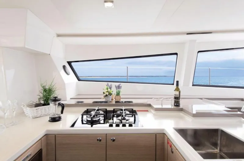 Slide: The Image of Modern kitchen interior on Bali 5.4 yacht, 2025 model, with ocean view. - 16