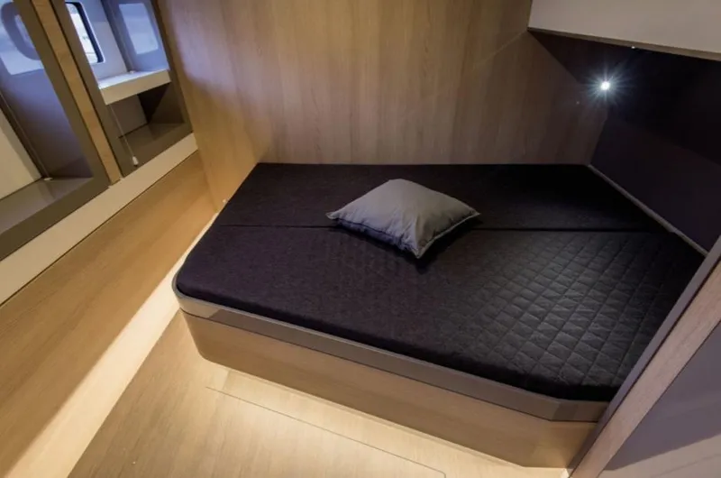 Slide: The Image of Cozy cabin interior of 2025 Bali 5.4 yacht with modern bedding and wooden accents. - 23