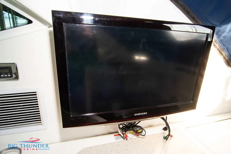 Slide: The Image of Samsung TV installed on a 2010 Sea Ray 540 Sundancer yacht interior. - 15
