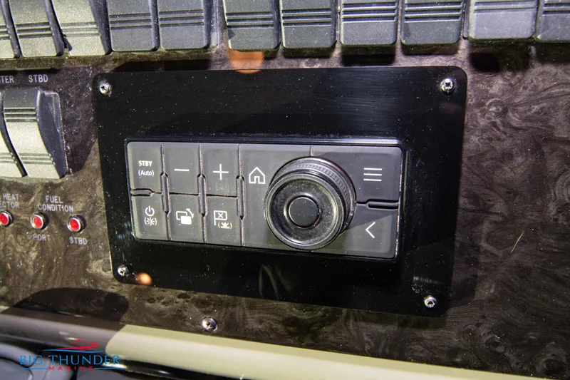 Slide: The Image of Control panel of 2010 Sea Ray 540 Sundancer yacht with navigation buttons. - 39