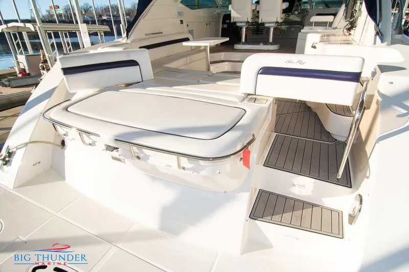 Slide: The Image of 2010 Sea Ray 540 Sundancer yacht with spacious deck and seating area. - 6