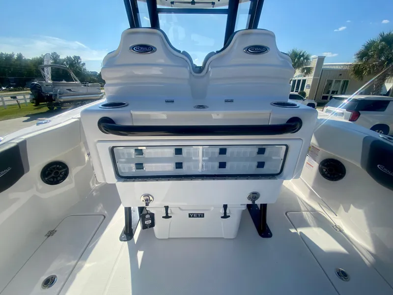Slide: The Image of 2026 Robalo R250 boat interior with seating and storage compartments. - 15