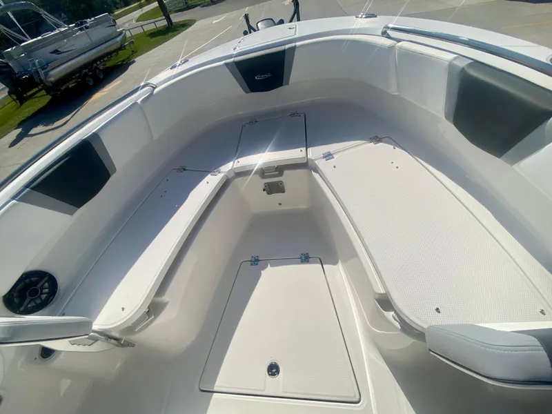 Slide: The Image of 2026 Robalo R250 boat interior with spacious seating and storage compartments. - 28