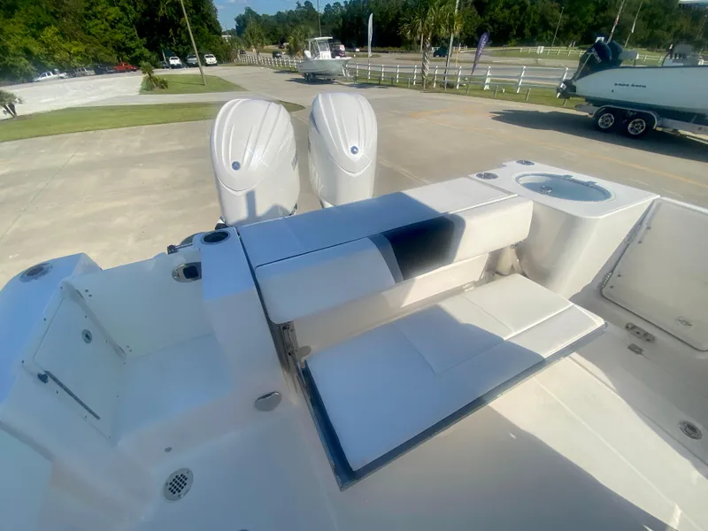 Slide: The Image of 2026 Robalo R250 boat with dual engines and spacious seating area. - 10