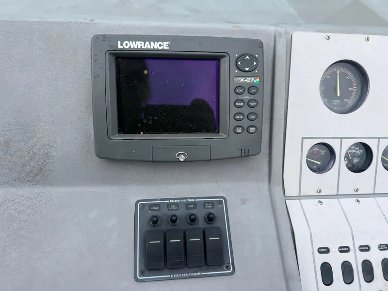 Slide: The Image of Control panel of a 1991 Cruisers Yachts Rouge 33 with Lowrance HDS-7 fishfinder. - 19