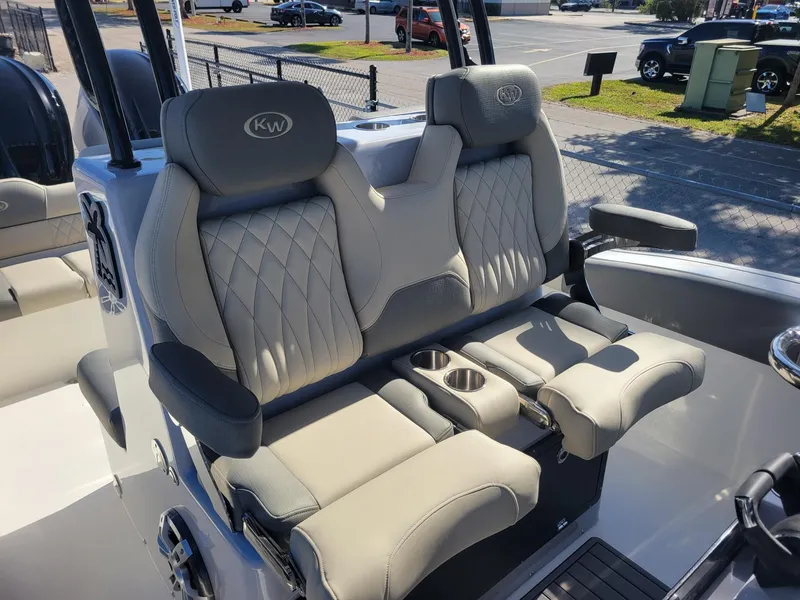 Slide: The Image of 2025 Key West 291 FS boat seats with cup holders and diamond stitching. - 12