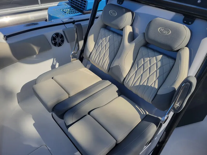 Slide: The Image of 2025 Key West 291 FS boat interior with luxurious seating and modern design. - 13