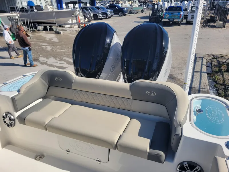 Slide: The Image of 2025 Key West 291 FS boat with dual engines and comfortable seating. - 6
