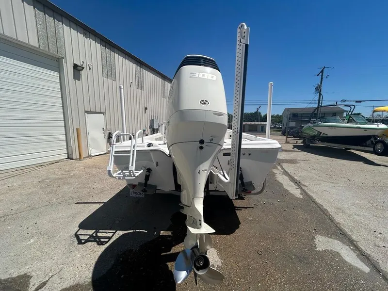 Slide: The Image of 2019 Blue Wave 2400 PureBay boat with 300 HP engine, rear view. - 10
