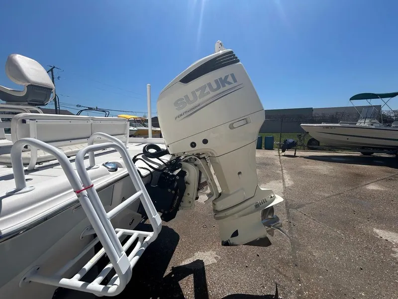 Slide: The Image of 2019 Blue Wave 2400 PureBay boat with Suzuki outboard motor. - 12