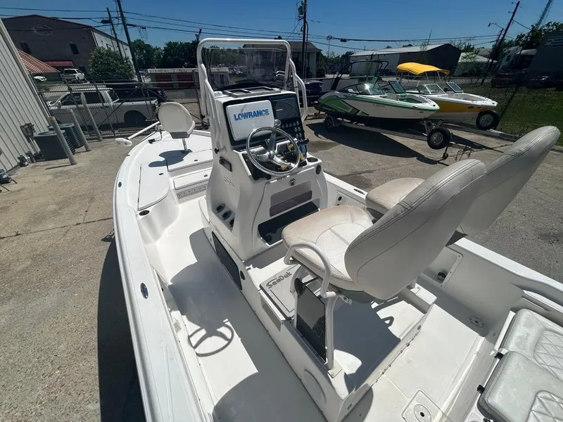 Slide: The Image of 2019 Blue Wave 2400 PureBay boat with dual seats and navigation system. - 15