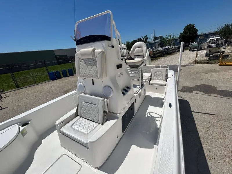 Slide: The Image of 2019 Blue Wave 2400 PureBay boat with white interior and seating. - 26