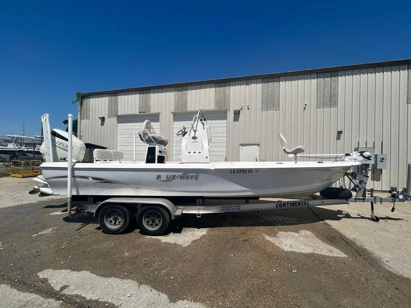 Slide: The Image of 2019 Blue Wave 2400 PureBay boat on a Continental trailer. - 8